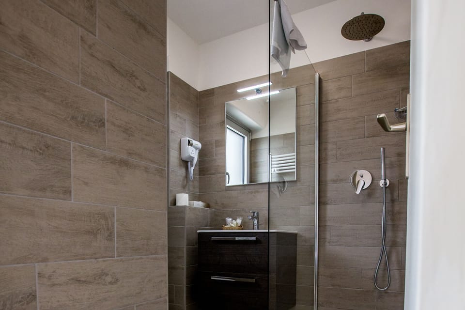 Deep soaking tub, rainfall showerhead, free toiletries, hair dryer