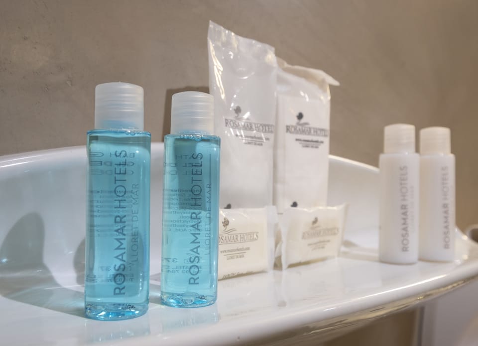 Shower, eco-friendly toiletries, hair dryer, towels