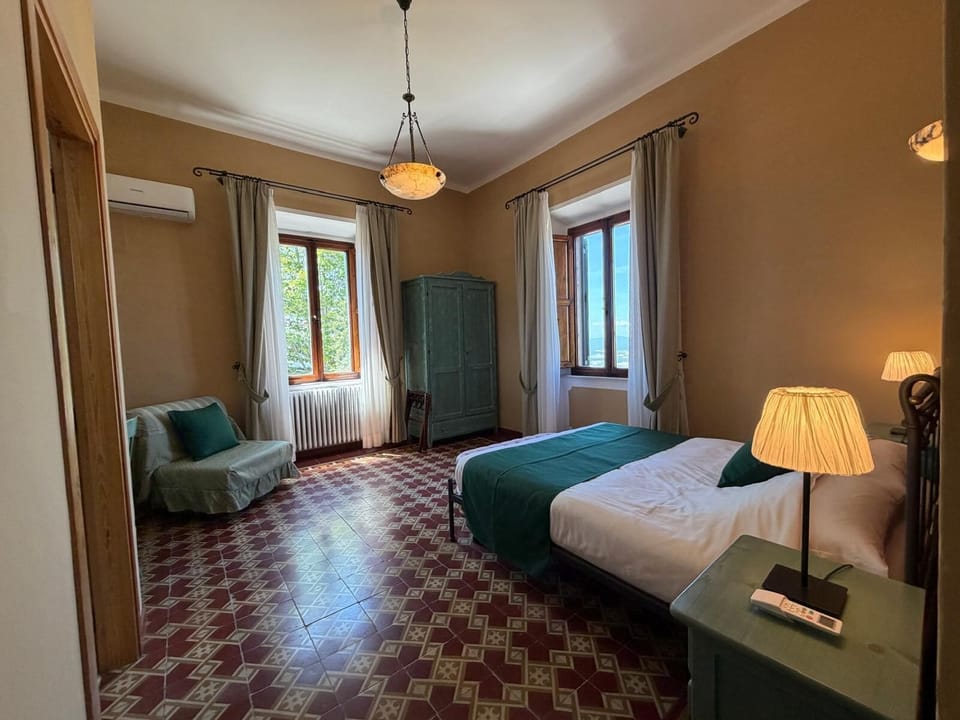 Deluxe Double Room, Hill View | Minibar, in-room safe, desk, laptop workspace