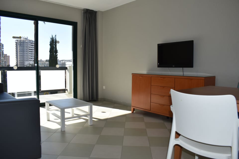 Flat-screen TV, books