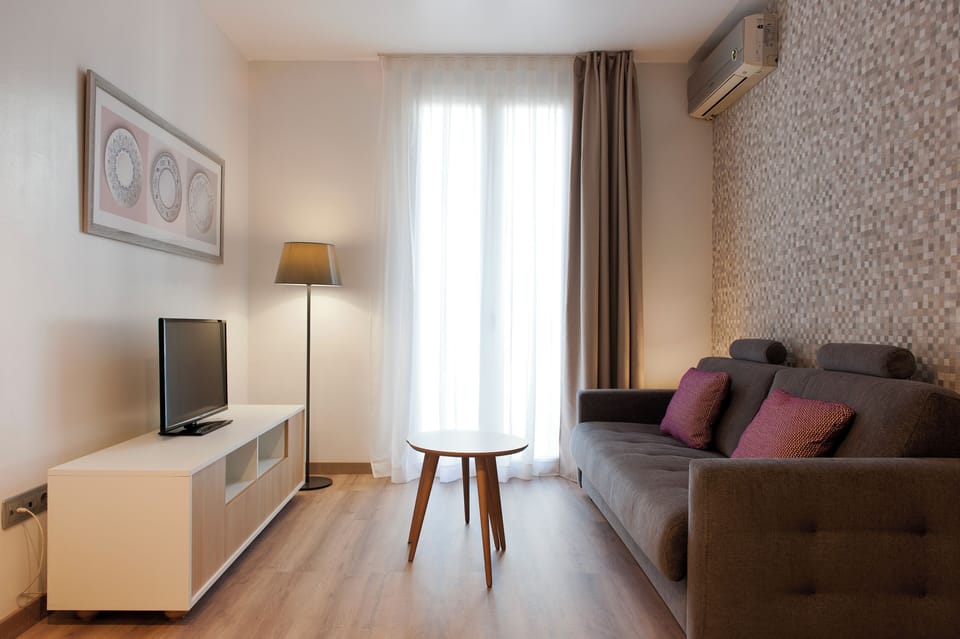 Superior Apartment, 2 Bedrooms | Living area | 32-inch flat-screen TV with satellite channels, TV