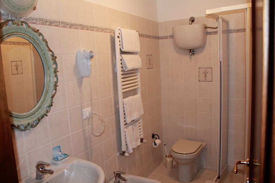 Superior Double Room, Private Bathroom (External) | Bathroom | Hair dryer, towels