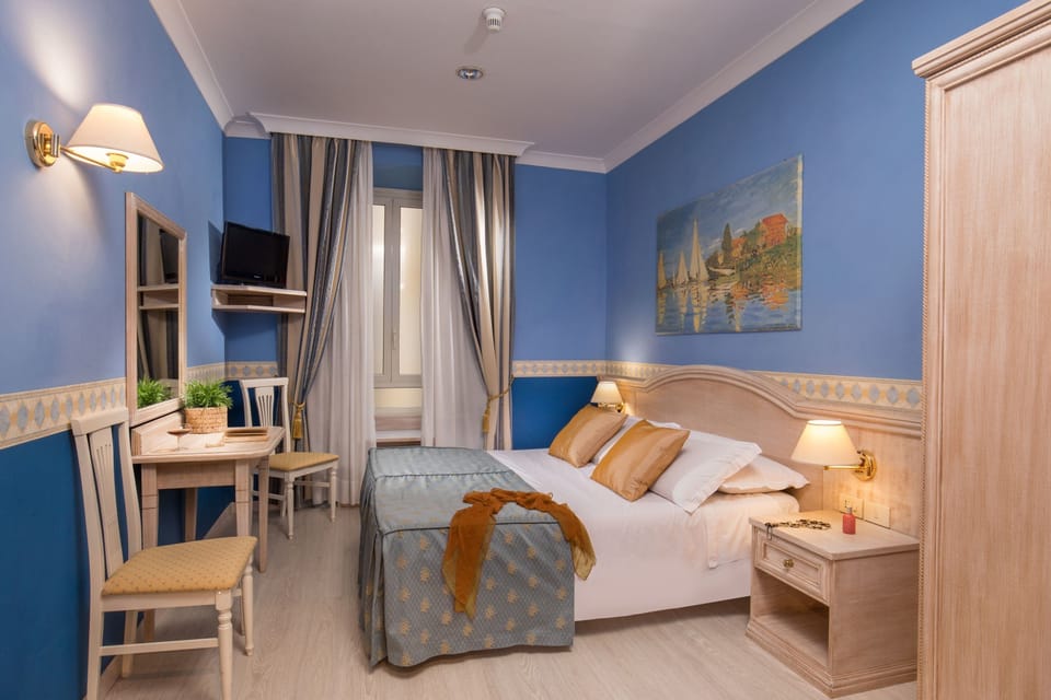 Economy Double Room | Minibar, in-room safe, desk, soundproofing