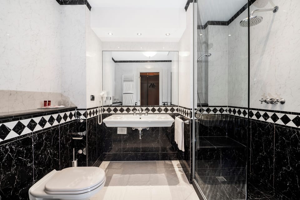 Hair dryer, slippers, bidet, towels