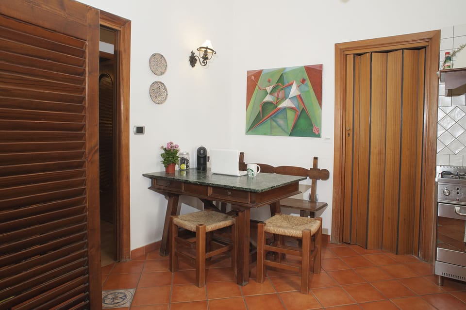 Triple Room | Shared kitchen | Full-size fridge, microwave, stovetop, coffee/tea maker