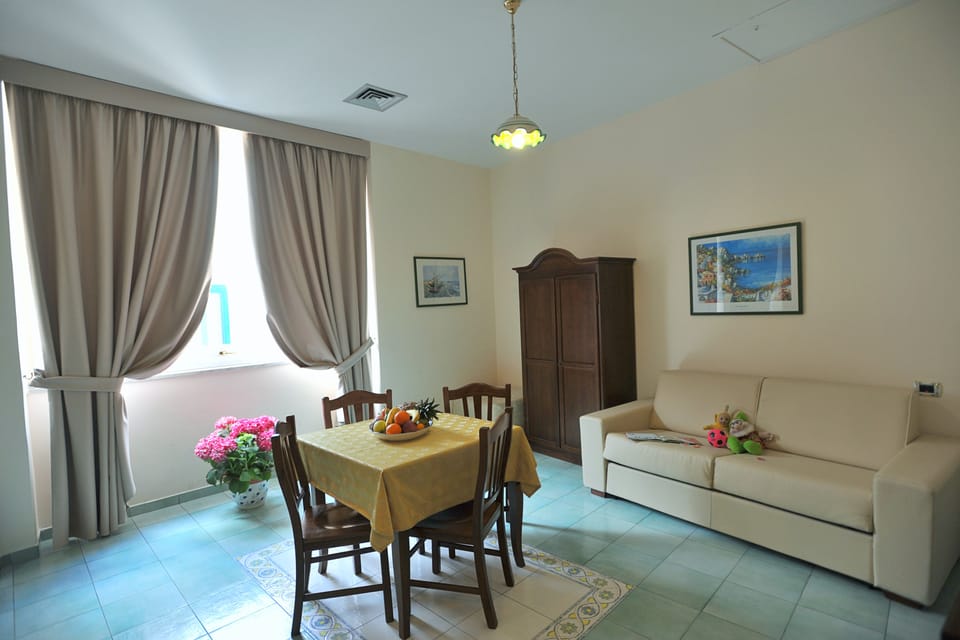 Family Suite | Living area | Flat-screen TV