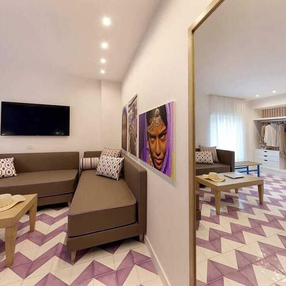 Quadruple Room | Frette Italian sheets, down comforters, memory foam beds, minibar