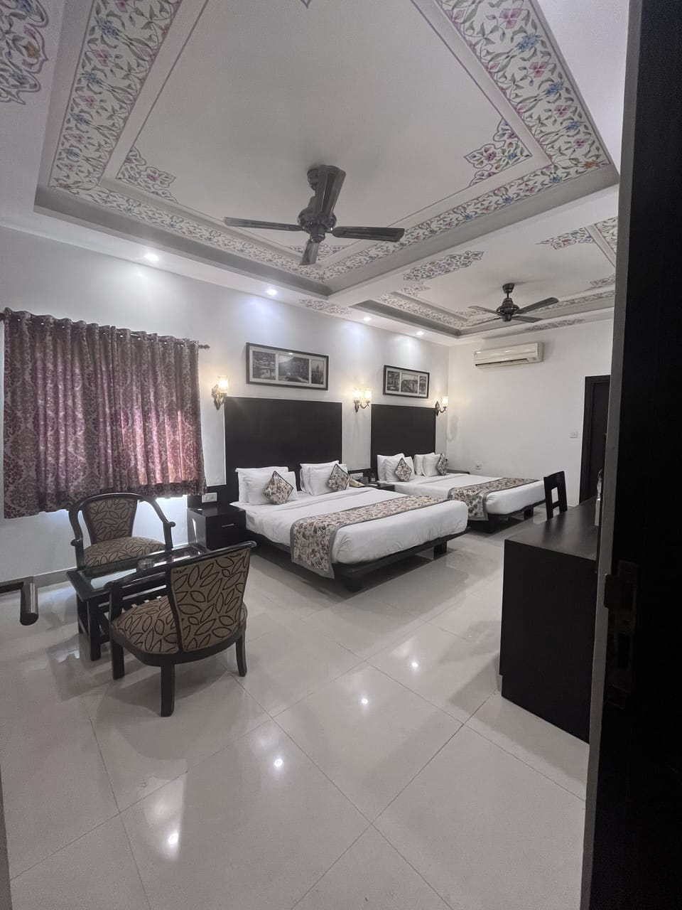 Family Room, 2 Queen Beds | Select Comfort beds, minibar, in-room safe, individually decorated