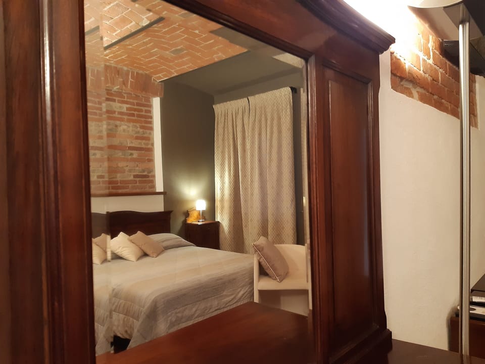 Down comforters, pillowtop beds, minibar, individually decorated