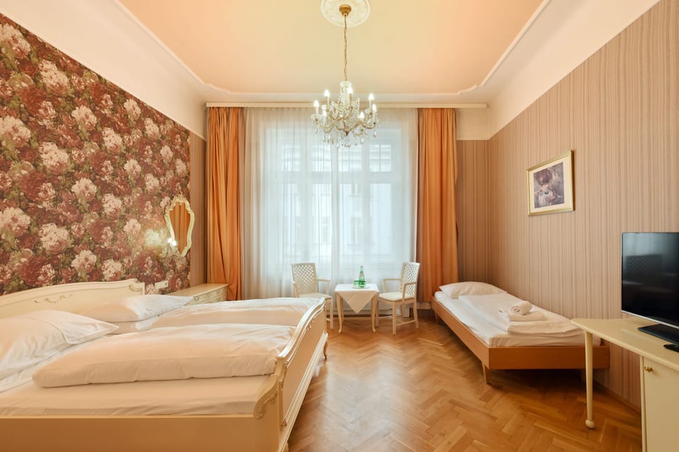 Comfort Triple Room | Premium bedding, in-room safe, free WiFi, bed sheets