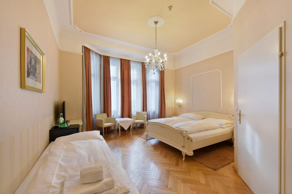 Comfort Triple Room | Premium bedding, in-room safe, free WiFi, bed sheets