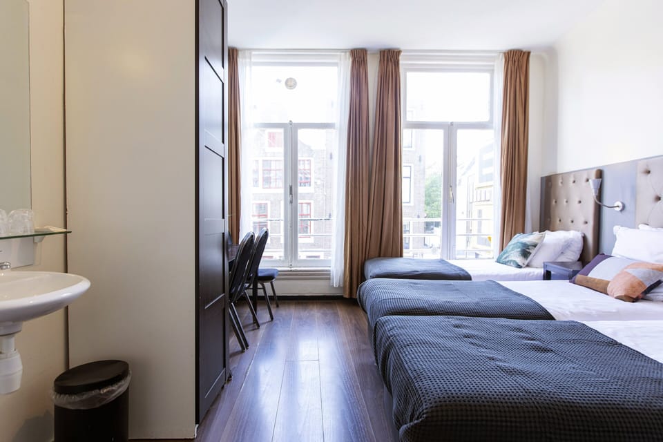 Basic Quadruple Room, Shared Bathroom | Free cribs/infant beds, free WiFi, bed sheets