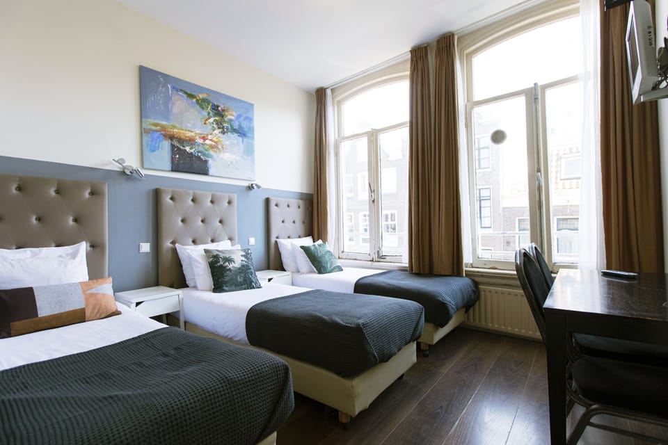 Basic Triple Room, 3 Twin Beds, Shared Bathroom (4th floor) | Free cribs/infant beds, free WiFi, bed sheets
