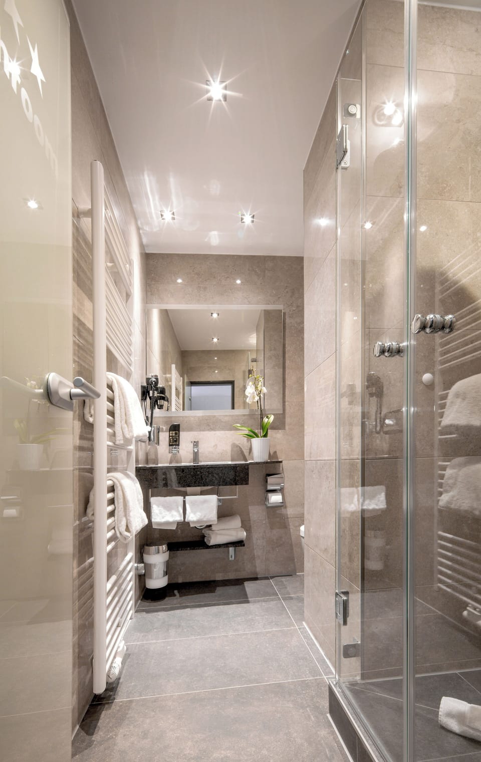Shower, free toiletries, hair dryer, slippers