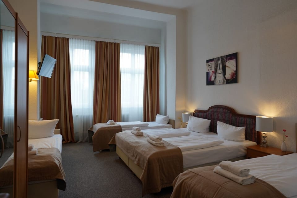 Family Room | Desk, iron/ironing board, cribs/infant beds, free WiFi