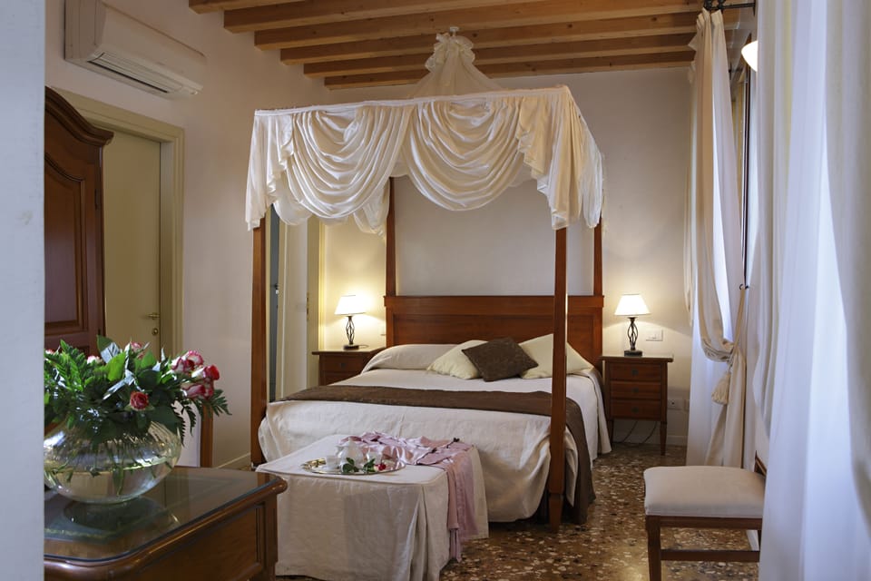 Double or Twin Room | Minibar, in-room safe, desk, iron/ironing board