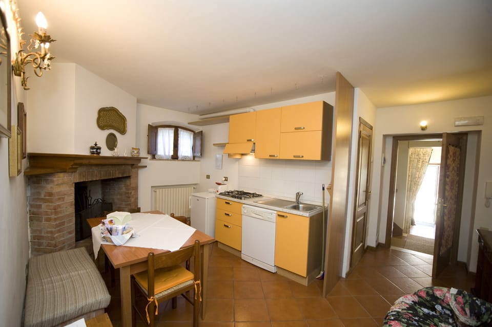 Full-size fridge, microwave, stovetop, coffee/tea maker