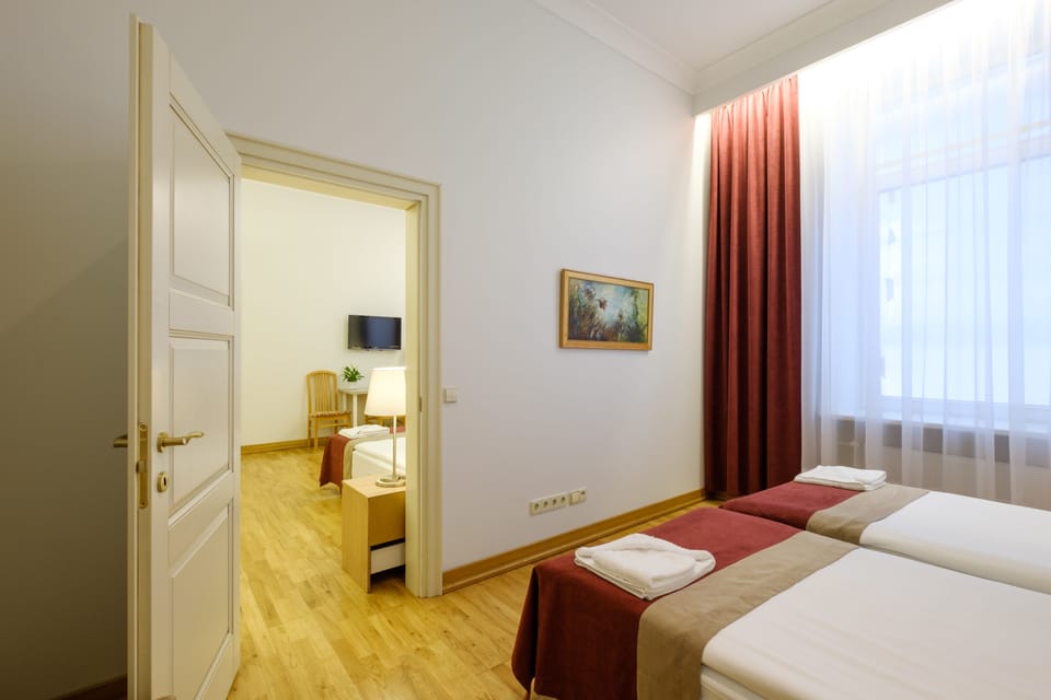 Quadruple Room | In-room safe, soundproofing, iron/ironing board, cribs/infant beds
