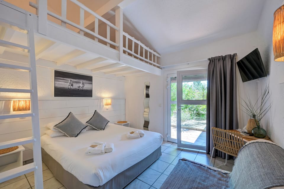 Triple Room ( Mezzanine ) | Minibar, in-room safe, desk, blackout drapes