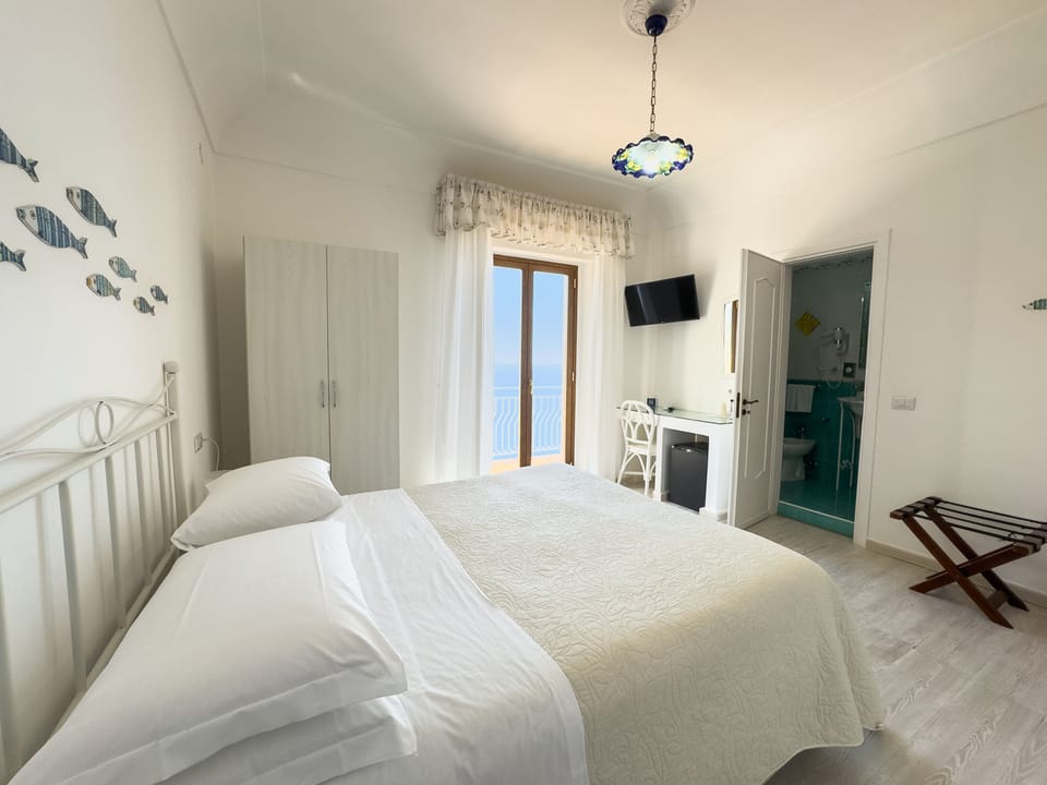 Double Room, Terrace, Sea View | Frette Italian sheets, memory foam beds, minibar, in-room safe