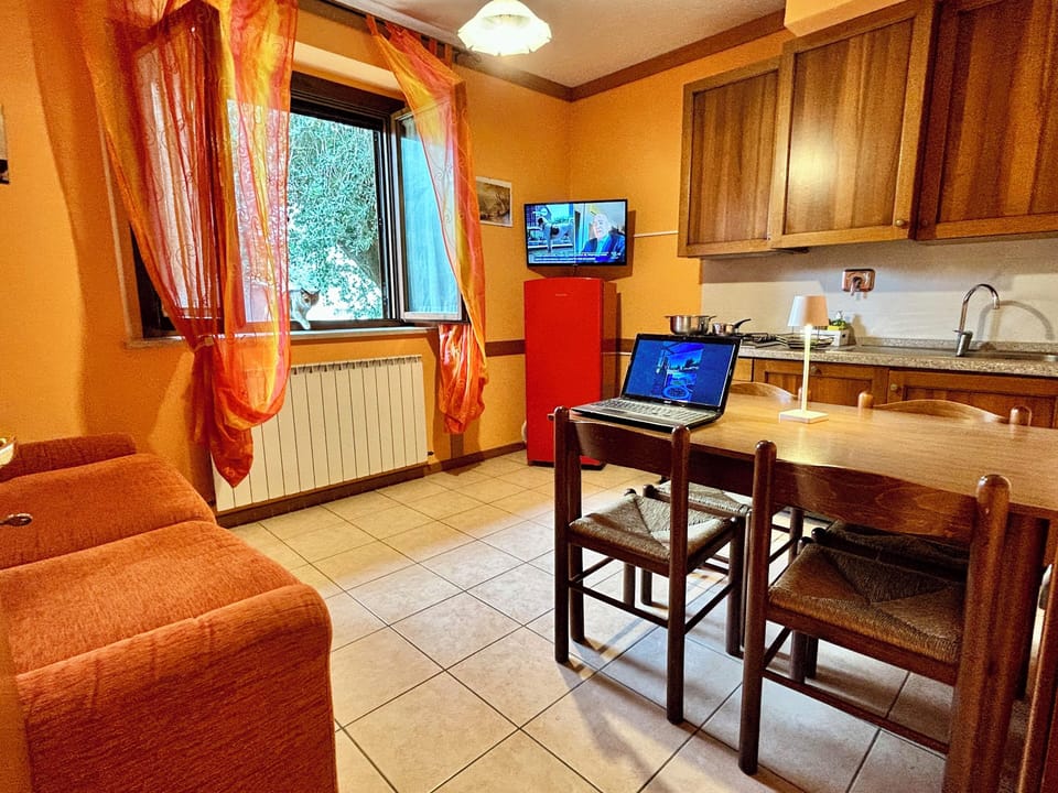 Standard Apartment, Garden View (Gemelli) | Living area | LED TV