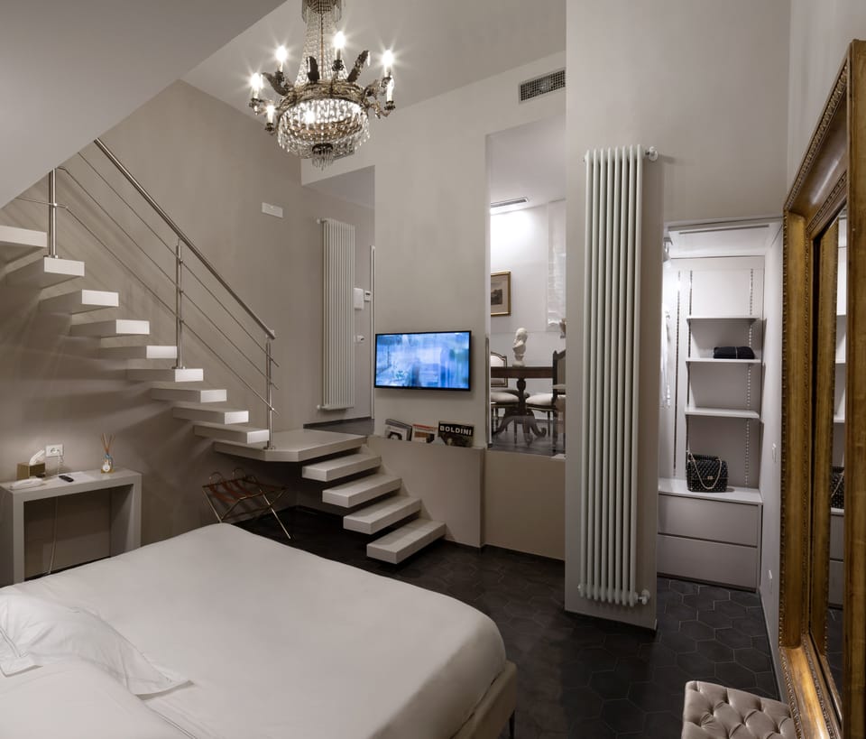 Premium bedding, down comforters, minibar, in-room safe