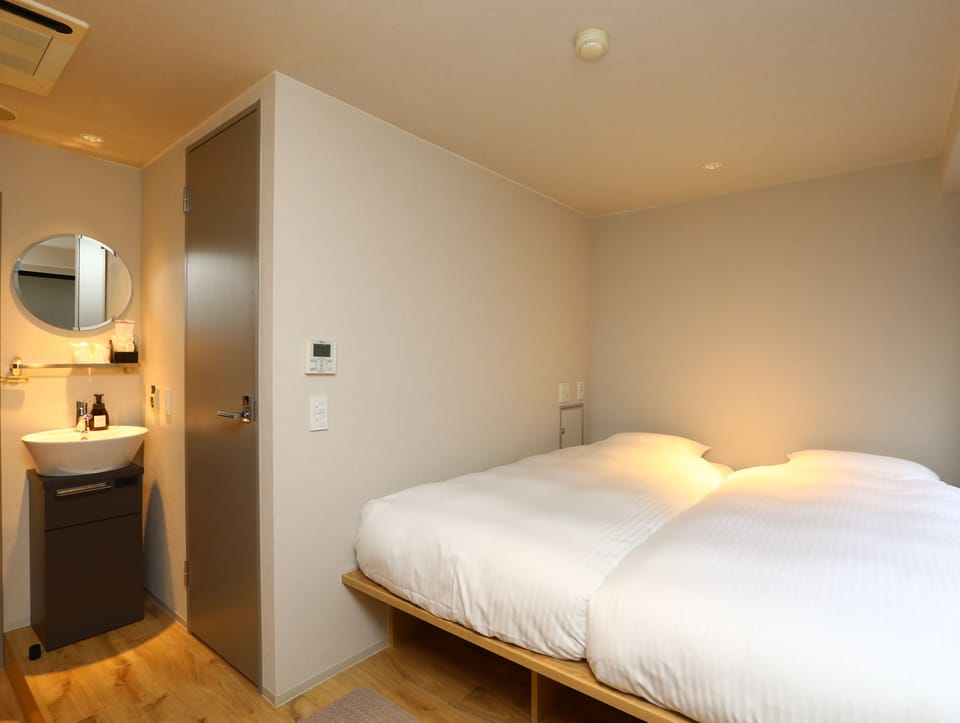 Twin Room, Non Smoking | Desk, blackout drapes, iron/ironing board, free WiFi