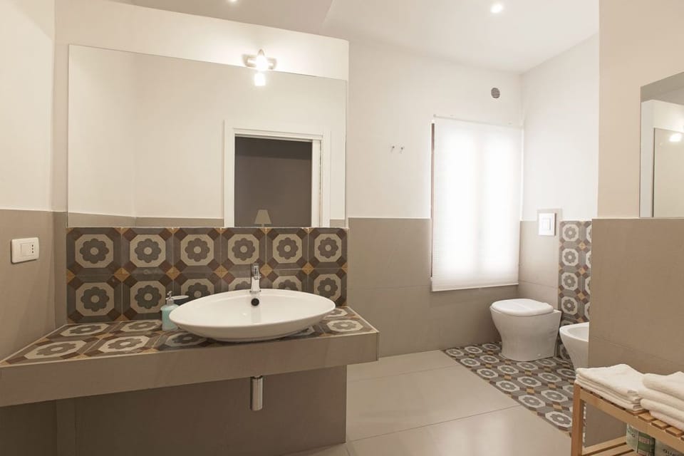 Quadruple Room, Balcony | Bathroom | Free toiletries, hair dryer, bidet, towels