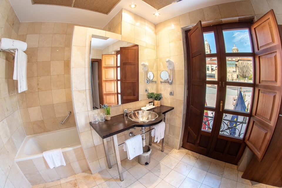 Double or Twin Room | Bathroom | Combined shower/tub, eco-friendly toiletries, bidet, towels