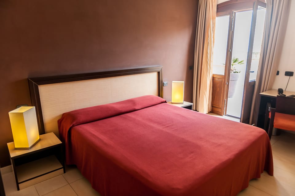 Comfort Double or Twin Room, Terrace | Frette Italian sheets, pillowtop beds, minibar, in-room safe
