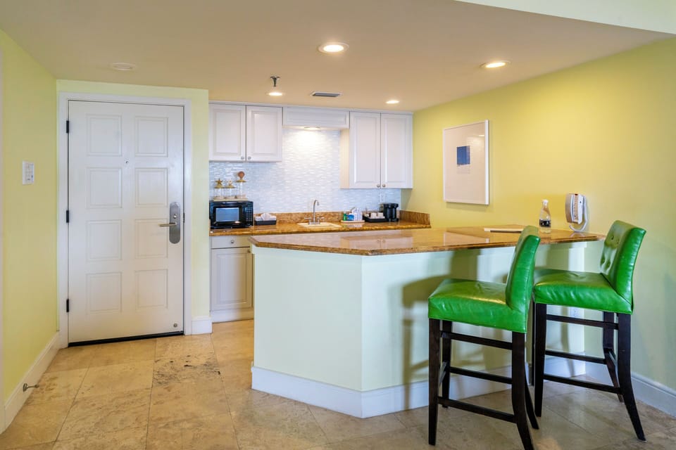 Suite, One King and One Sofa Bed, Ocean View | Private kitchen | Coffee/tea maker