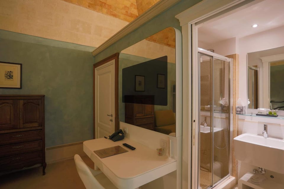 Shower, rainfall showerhead, designer toiletries, hair dryer