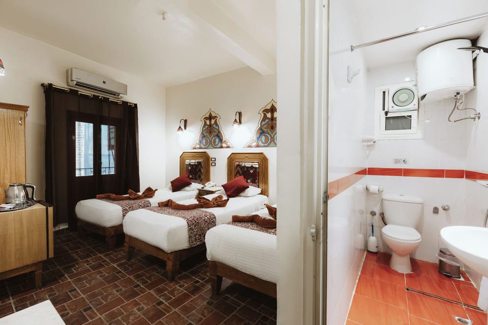 Traditional Triple Room | Egyptian cotton sheets, hypo-allergenic bedding, minibar, in-room safe
