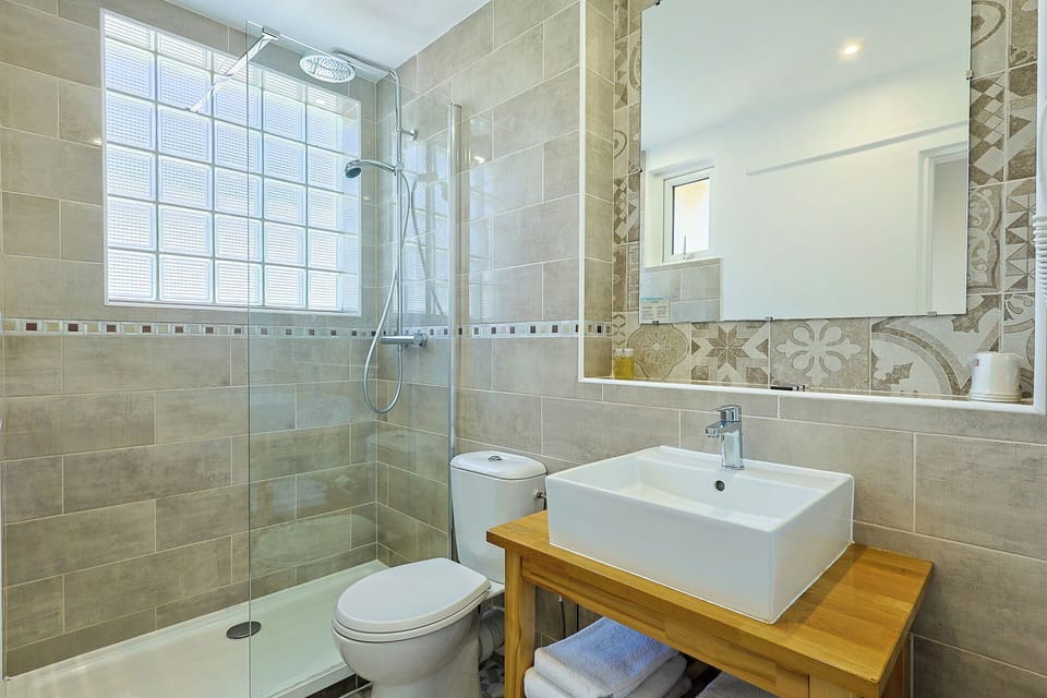 Triple Room, Courtyard View | Select Comfort beds, in-room safe, free cribs/infant beds, free WiFi