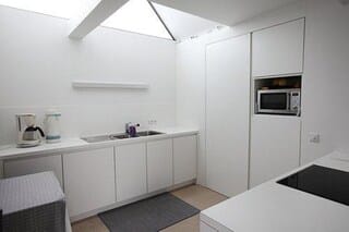 Fridge, coffee/tea maker, cookware/dishes/utensils