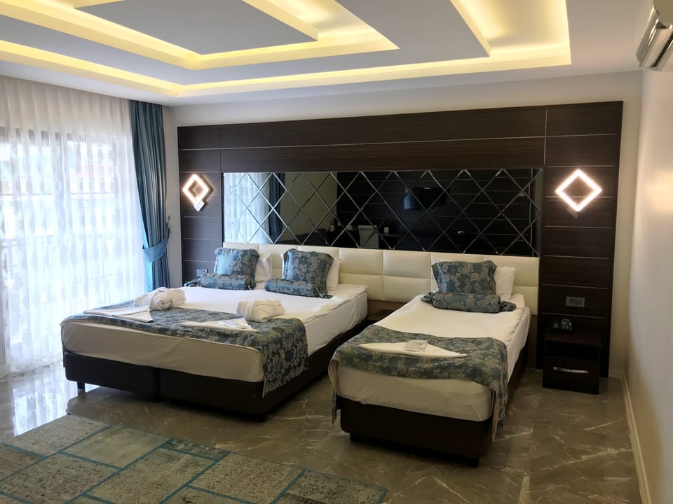 Triple Room | Premium bedding, minibar, desk, soundproofing