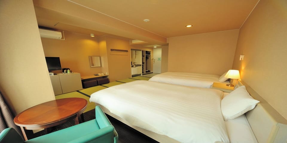 Premium bedding, down comforters, blackout drapes, free WiFi