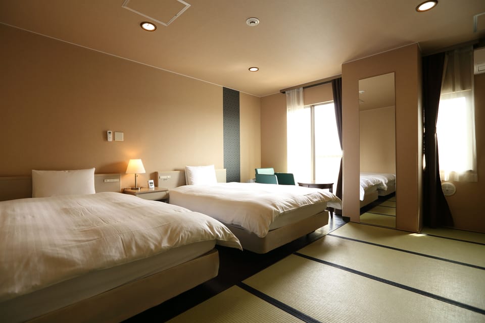Premium bedding, down comforters, blackout drapes, free WiFi
