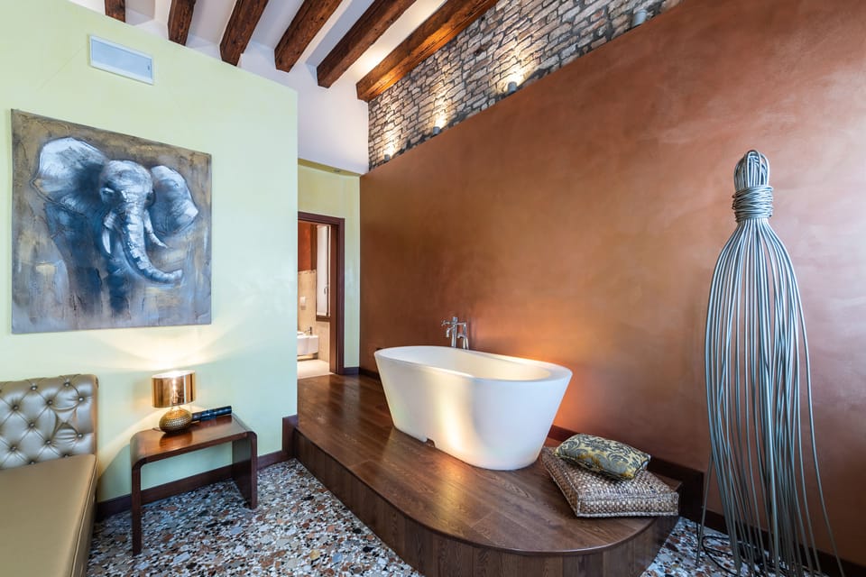 Suite, City View | Free minibar items, in-room safe, individually decorated, desk
