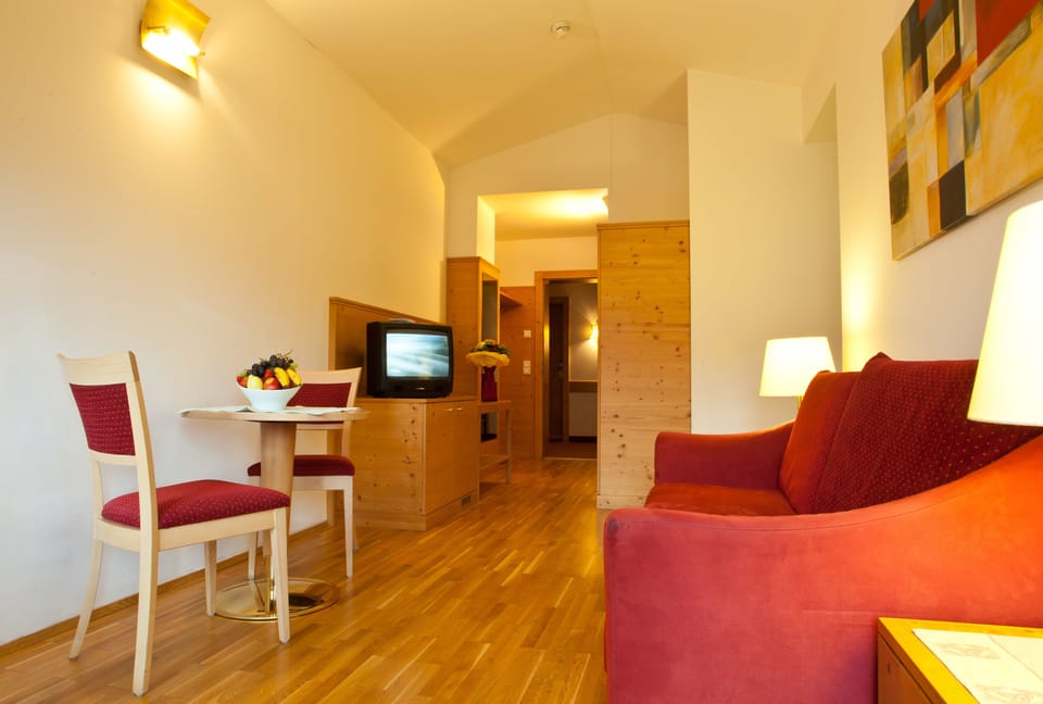 Studio, 1 Bedroom, Balcony, Mountainside | Living room | Flat-screen TV
