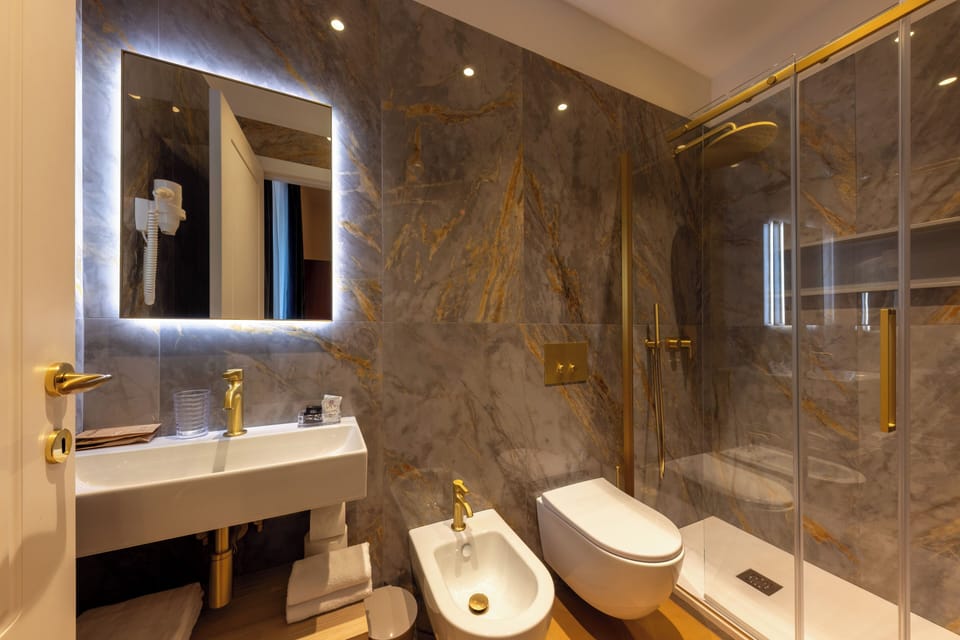 New Triple Room ( Stair Access Only) | Bathroom | Rainfall showerhead, free toiletries, hair dryer, towels