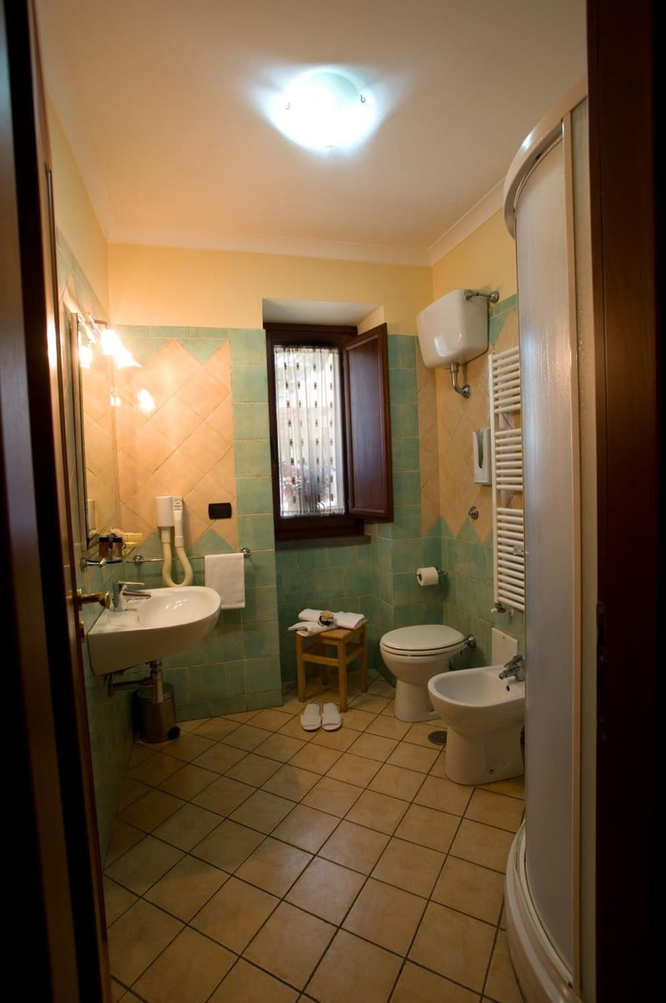 Shower, eco-friendly toiletries, hair dryer, bidet