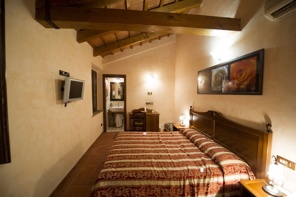 Down comforters, pillowtop beds, minibar, desk
