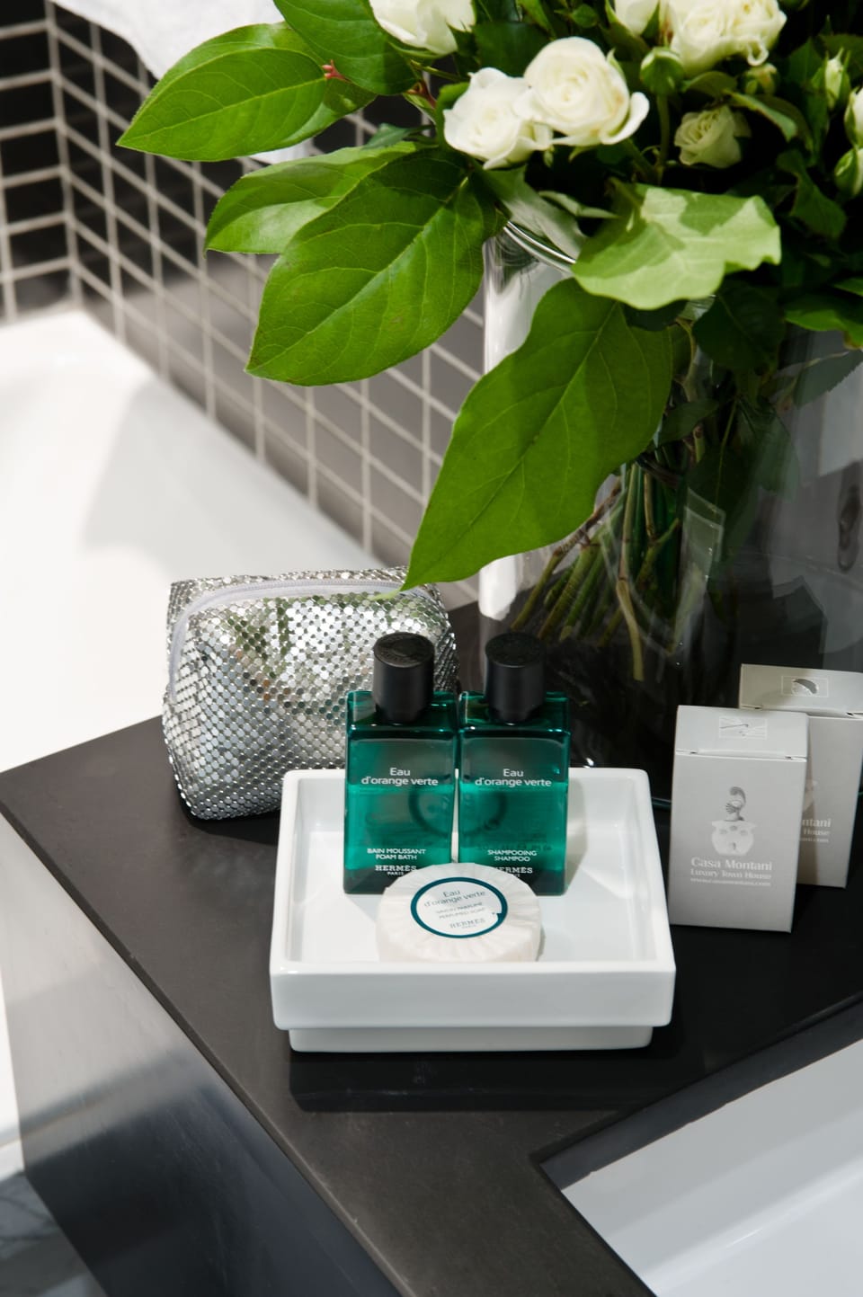 Rainfall showerhead, designer toiletries, hair dryer, slippers