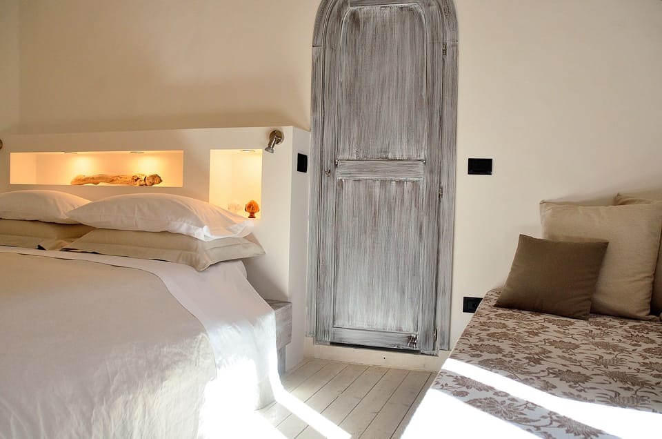Junior suite with balcony / double or twin | Frette Italian sheets, down comforters, Select Comfort beds
