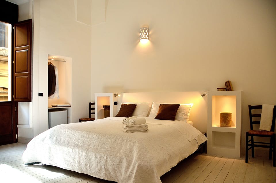 Frette Italian sheets, down comforters, Select Comfort beds