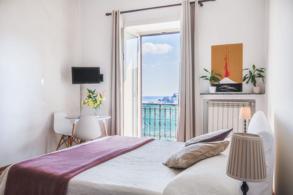 Panoramic Triple Room, Multiple Beds, Balcony, Sea View | Down comforters, memory foam beds, minibar, individually decorated