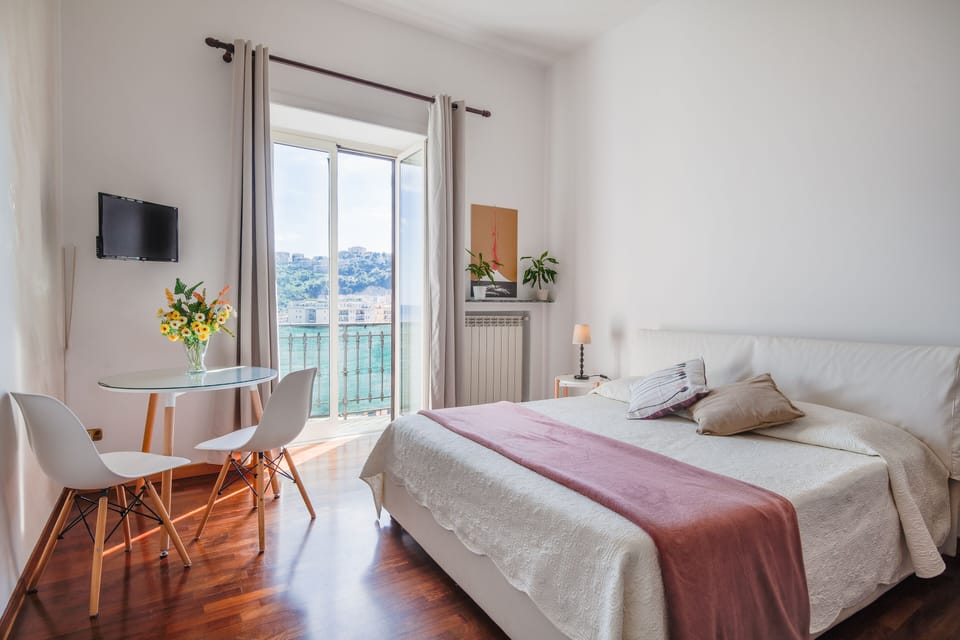 Panoramic Triple Room, Multiple Beds, Balcony, Sea View | Down comforters, memory foam beds, minibar, individually decorated