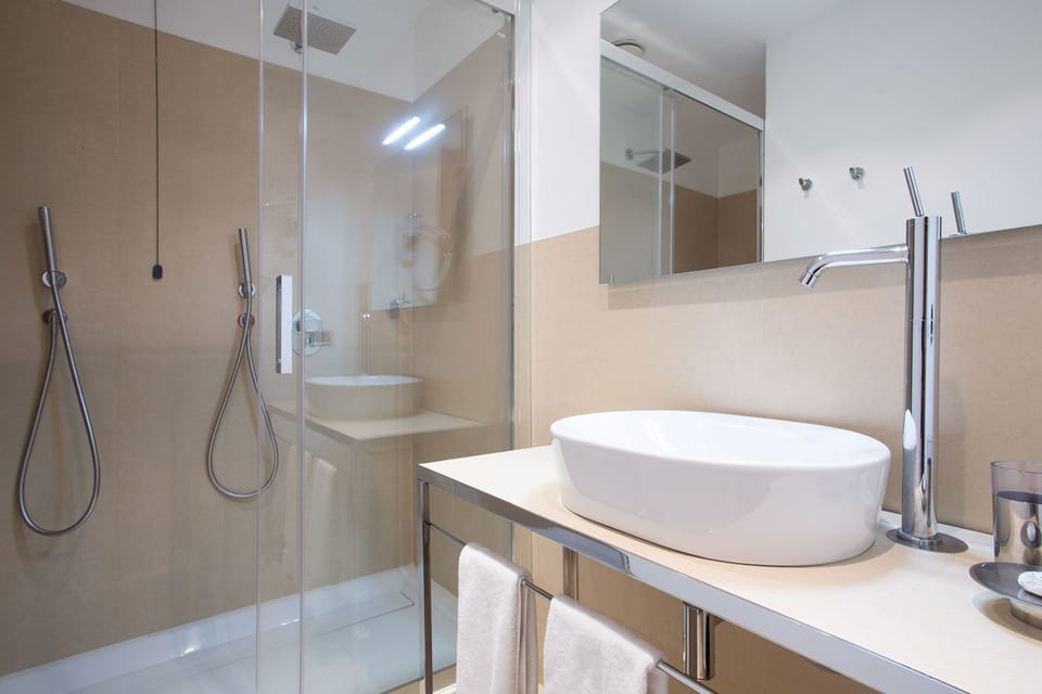 Family Suite, 2 Bedrooms | Bathroom | Shower, free toiletries, hair dryer, bidet