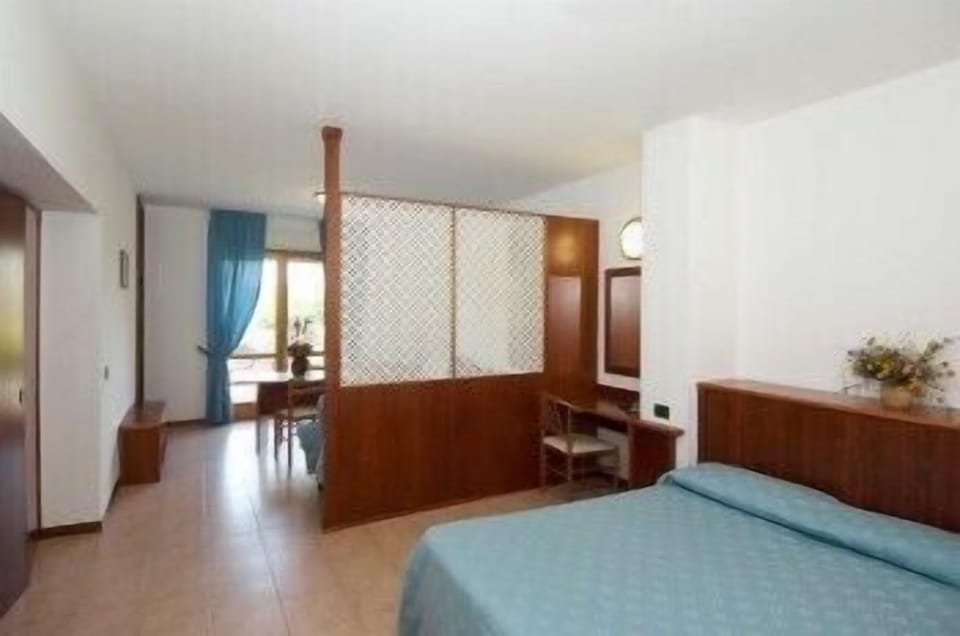 Superior Quadruple Room, 1 Bedroom, Pool View | Desk, free WiFi, bed sheets, wheelchair access